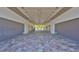 Long garage featuring pavers and ample parking spaces at 4910 W Mcelroy Ave # 6, Tampa, FL 33611