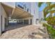 Spacious garage area featuring pavers and ample parking space at 4910 W Mcelroy Ave # 6, Tampa, FL 33611