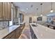Spacious kitchen with modern appliances, marble countertops, tile backsplash, and stylish cabinets at 4910 W Mcelroy Ave # 6, Tampa, FL 33611