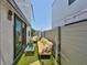 Inviting outdoor patio with comfortable seating, privacy fence, and stylish decor at 4910 W Mcelroy Ave # 6, Tampa, FL 33611
