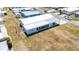 An aerial view of the home showing its roof, well maintained lawn and vibrant community at 5646 Cheyenne St, Zephyrhills, FL 33542