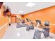Community gym featuring exercise equipment and a television for resident use at 5660 80Th N St # C101, St Petersburg, FL 33709