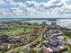 Beautiful condo community with lush landscaping and a golf course, set against a scenic waterfront at 6011 Bahia Del Mar Blvd # 158, St Petersburg, FL 33715