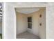 Condo entryway nook with access to an exterior staircase and the unit's front door at 6011 Bahia Del Mar Blvd # 158, St Petersburg, FL 33715