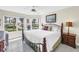 Spacious main bedroom with large windows and a ceiling fan at 6011 Bahia Del Mar Blvd # 158, St Petersburg, FL 33715