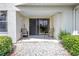 Cozy patio with a white gravel base and greenery, providing a relaxing outdoor space at 6011 Bahia Del Mar Blvd # 158, St Petersburg, FL 33715