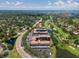 Aerial view of Golfview Condominiums highlighting the community's golf course and water views at 6150 Gulfport S Blvd # 306, Gulfport, FL 33707