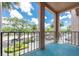Enjoy city views from this balcony with black metal railings and a concrete patio at 6150 Gulfport S Blvd # 306, Gulfport, FL 33707