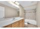 Bathroom featuring a tub and shower combination and modern single sink vanity at 6150 Gulfport S Blvd # 306, Gulfport, FL 33707