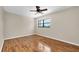 Bright bedroom with a ceiling fan, modern flooring, and lots of natural light at 6150 Gulfport S Blvd # 306, Gulfport, FL 33707