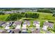 Beautiful aerial shot of the home, highlighting its location, nearby ponds, and well-maintained landscaping at 6253 Hidden Branch Dr, Apollo Beach, FL 33572