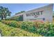 Waterset community entrance featuring lush landscaping and a prominent sign at 6253 Hidden Branch Dr, Apollo Beach, FL 33572