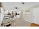 Open-concept layout shows the kitchen, breakfast bar and eat-in area with backyard views at 701 Millifold Pl, Brandon, FL 33510
