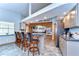 Spacious kitchen with bar seating, modern appliances, and stylish brick accents at 709 Sportsman Park Dr, Seffner, FL 33584
