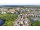 Stunning aerial shot of a residential area nestled between two serene lakes and green landscape at 7235 Sharpsburg Blvd, New Port Richey, FL 34653