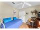Bedroom with ceiling fan and a view of the closet and other amenities at 7235 Sharpsburg Blvd, New Port Richey, FL 34653