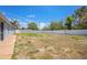Spacious backyard with a full perimeter fence, offering privacy and ample space for recreation at 7285 Nightwalker Rd, Weeki Wachee, FL 34613