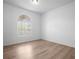 Bright room with ample natural light and a neutral color scheme to create a welcoming atmosphere at 7285 Nightwalker Rd, Weeki Wachee, FL 34613