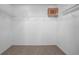 Walk-in closet features built in shelving and neutral carpeting at 7285 Nightwalker Rd, Weeki Wachee, FL 34613