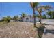 An eye-level view of a charming single-Gathering home featuring a well-manicured front yard at 7285 Nightwalker Rd, Weeki Wachee, FL 34613