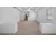 Carpeted living room features neutral walls, a ceiling fan and recessed lighting at 7285 Nightwalker Rd, Weeki Wachee, FL 34613