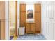 Bathroom featuring vanity with upper cabinets and adjacent door to toilet at 7903 Heather Ct, Tampa, FL 33634