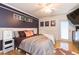 Bedroom featuring soft lighting, a ceiling fan, and a sliding glass door at 7903 Heather Ct, Tampa, FL 33634