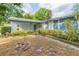 Charming single-story home with lovely landscaping and inviting entrance at 7903 Heather Ct, Tampa, FL 33634