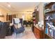 A stylish home office transitioning into a dining area with neutral colors, offering great space for work or leisure at 7903 Heather Ct, Tampa, FL 33634