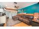 Cozy living room with hardwood floors, comfortable seating, and natural light from sliding glass doors at 7903 Heather Ct, Tampa, FL 33634