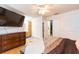 Primary bedroom featuring recessed lighting, a ceiling fan, and a wooden dresser at 7903 Heather Ct, Tampa, FL 33634
