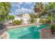 Beautiful backyard pool with brick surround and an area for seating, perfect for relaxation and recreation at 7903 Heather Ct, Tampa, FL 33634