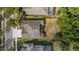 Aerial view of home with lush backyard landscaping at 7911 Hampton Lake Dr, Tampa, FL 33647