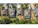 Aerial view of the neighborhood, showcasing the community's layout and lush landscaping at 7911 Hampton Lake Dr, Tampa, FL 33647