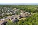 Aerial view of the neighborhood, showcasing the community's layout and lush landscaping at 7911 Hampton Lake Dr, Tampa, FL 33647