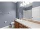 The bathroom features a large vanity, and a full bath and shower combo at 7911 Hampton Lake Dr, Tampa, FL 33647