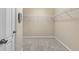Walk-in closet featuring shelving for storage at 7911 Hampton Lake Dr, Tampa, FL 33647