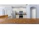 Bright kitchen with granite countertops, stainless steel appliances, and white cabinets at 7911 Hampton Lake Dr, Tampa, FL 33647