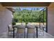 This screened patio is great for outdoor dining, and offers a view of the yard at 7911 Hampton Lake Dr, Tampa, FL 33647