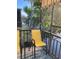 Charming balcony seating area with lake views provides a perfect spot to unwind at 7951 58Th N Ave # 308, St Petersburg, FL 33709