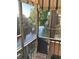 Relaxing balcony view showcasing scenic water and landscaped surroundings at 7951 58Th N Ave # 308, St Petersburg, FL 33709