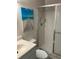 Bathroom features modern matte black fixtures, vanity and a shower behind glass doors at 7951 58Th N Ave # 308, St Petersburg, FL 33709