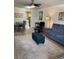 This living room boasts new floors, modern furnishings, an open layout, and seamlessly connects to the kitchen and dining areas at 7951 58Th N Ave # 308, St Petersburg, FL 33709