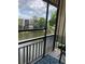 Exterior patio with a view of a pond and buildings at 7951 58Th N Ave # 308, St Petersburg, FL 33709