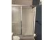 Shower featuring white tiles, sliding glass door and matte black trim at 7951 58Th N Ave # 308, St Petersburg, FL 33709