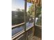 This outdoor patio has scenic views overlooking a lake with mature trees nearby at 7951 58Th N Ave # 308, St Petersburg, FL 33709