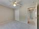 Cozy bedroom featuring carpeted floors and a ceiling fan at 812 Amethyst Way, Valrico, FL 33594