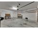 Spacious garage with work bench, door and plentiful storage space at 812 Amethyst Way, Valrico, FL 33594