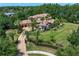 Stunning aerial view of the estate showcasing the lush landscaping, expansive lawn, and circular driveway at 1102 Merry Water Dr, Lutz, FL 33548