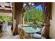 Breakfast nook with glass table and views of the pool and landscaped backyard at 1102 Merry Water Dr, Lutz, FL 33548